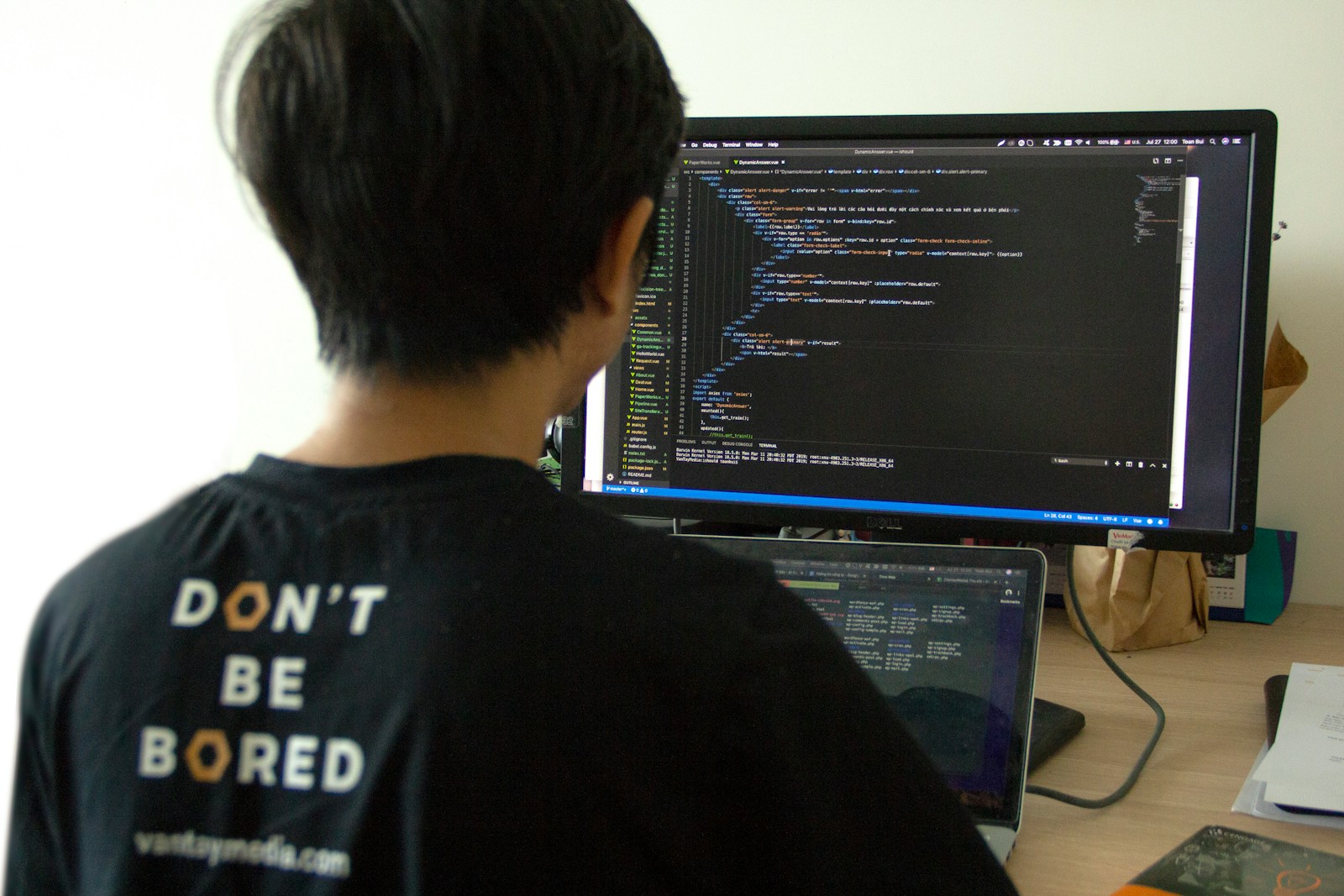 http://man%20in%20black%20shirt%20using%20laptop%20computer%20and%20flat%20screen%20monitor